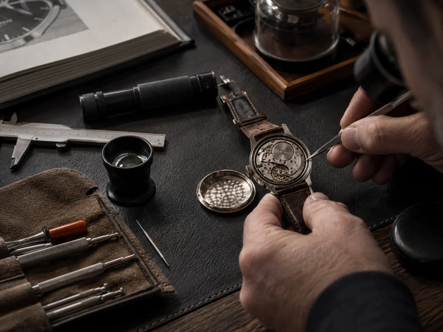 A watch under the loupe on the Wristly bench with its timegrapher trace visible